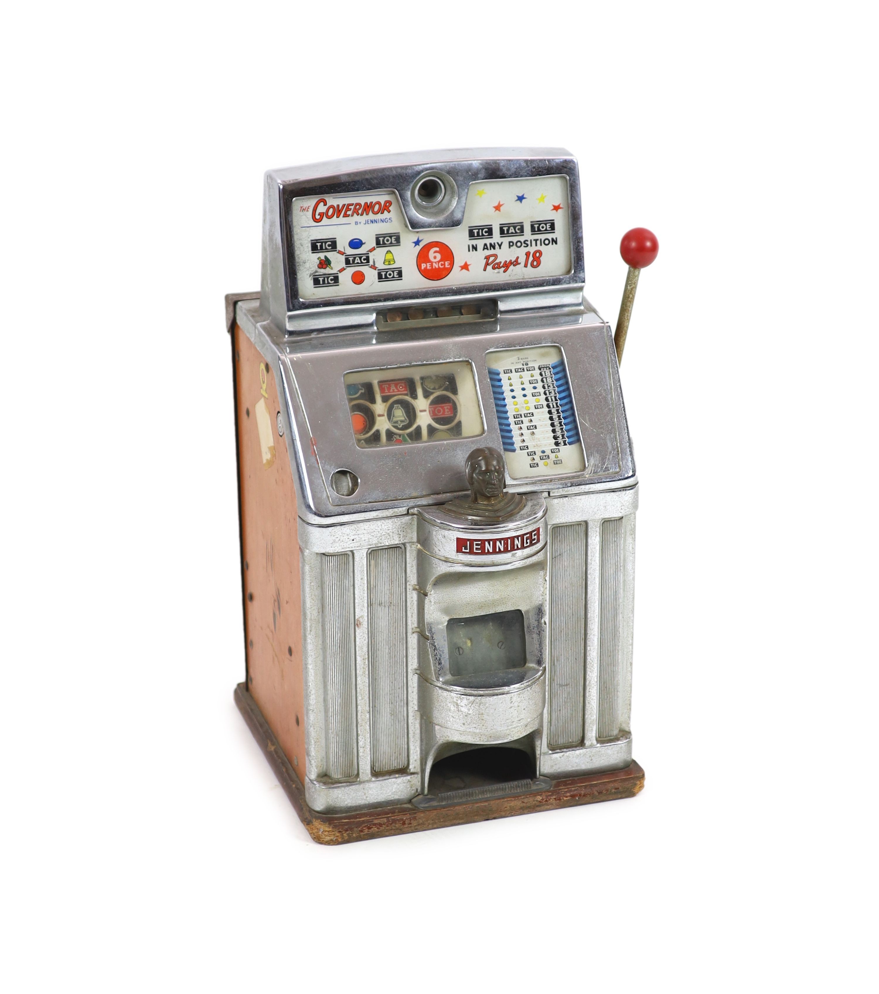 A Jennings 'The Governor' Tic Tac Toe penny slot machine, width 39cm depth 44cm height 69cm